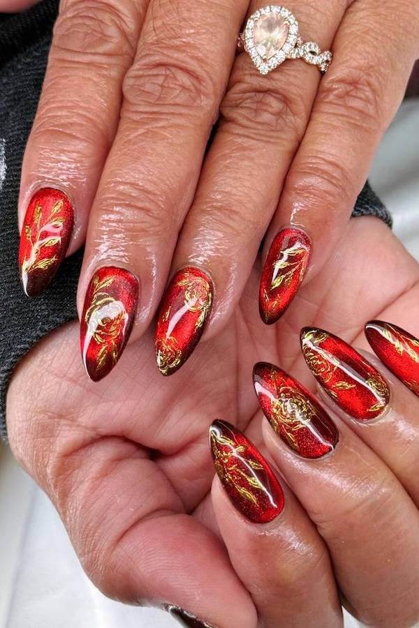 Red Cat Eye Nails with Gold Foil Art