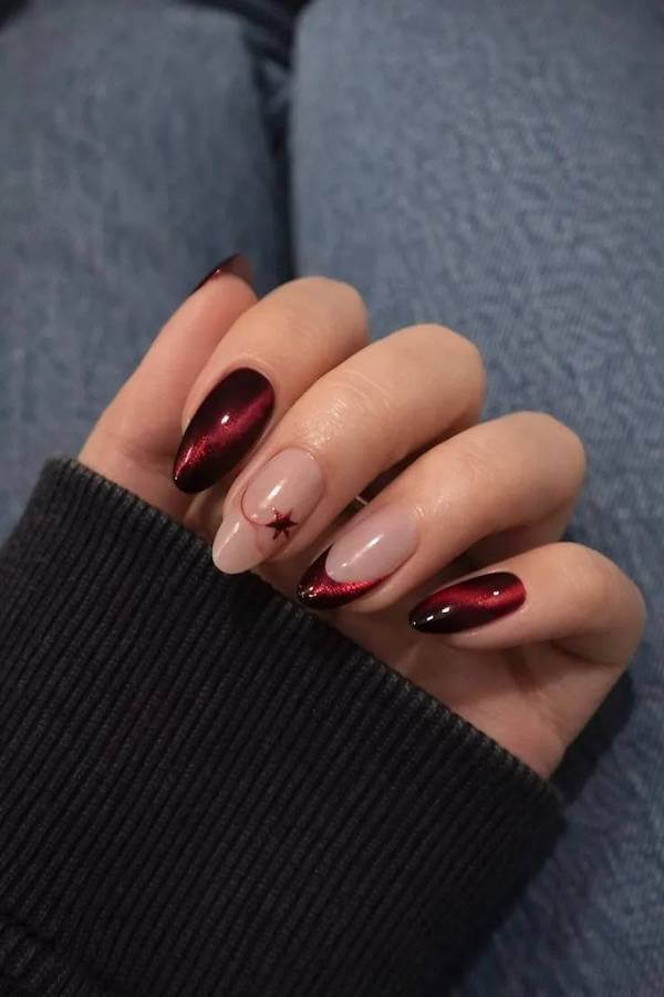 Red Cat Eye Nails with Single Star Accent