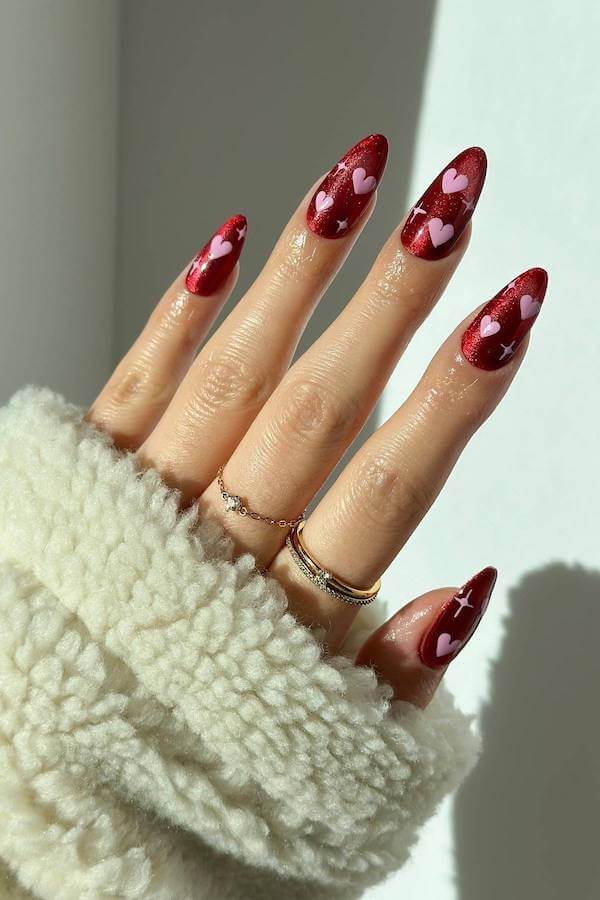 Red Cat Eye Nails with Pink Heart Accents