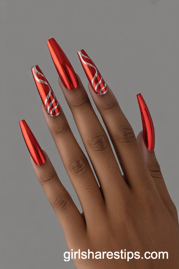 Extra-Long Coffin Red Chrome Nails with Swirling Silver Accents