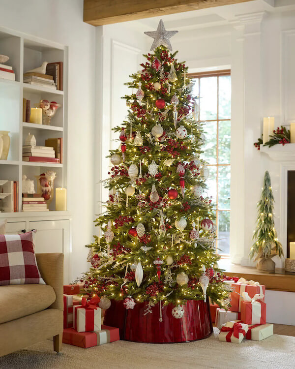 Red and Gold Christmas Tree with Silver Ornaments and Star Topper