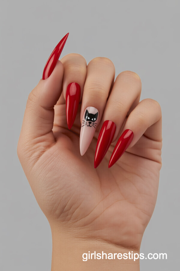 Long Stiletto Red Nails with a Hand-Painted Black Cat Face