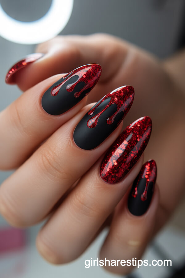 Matte Black and Glossy Red Glitter Drip Almond Nails
