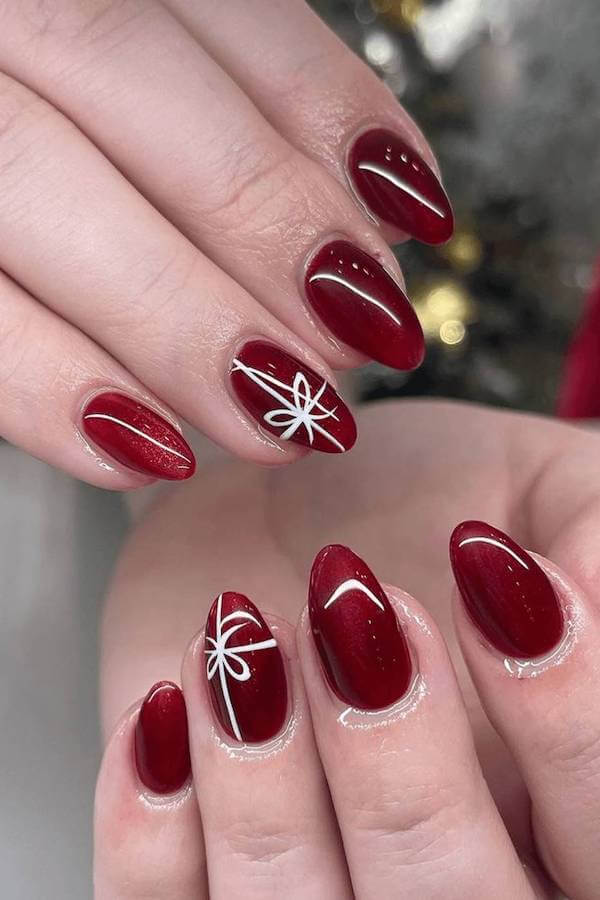 Red Nails with White Bow Accent