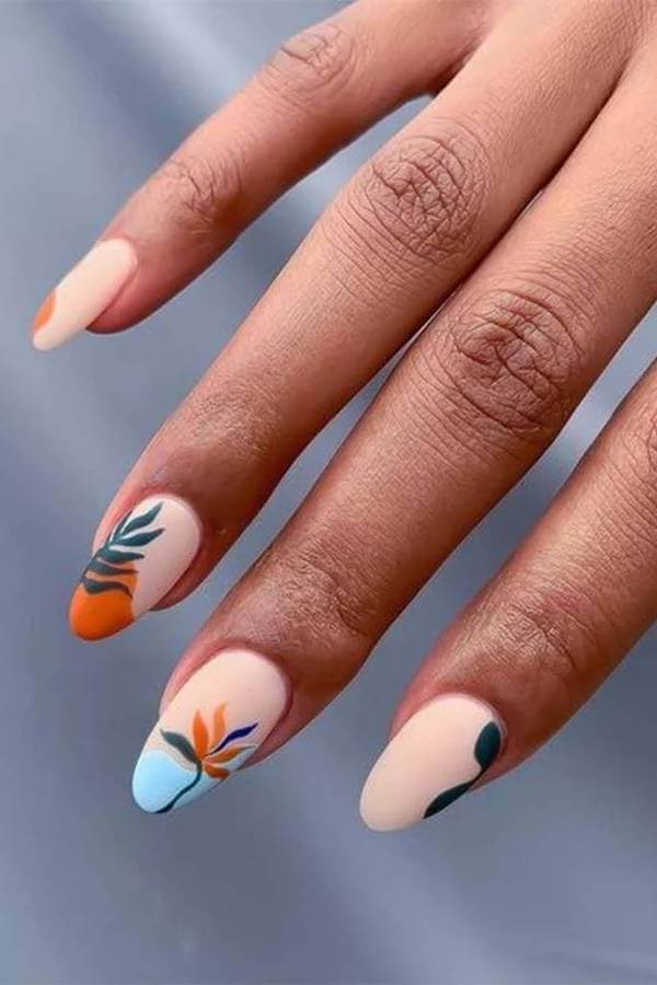 Matte Pastel Nails With Tropical Leaf Accents
