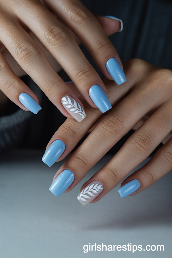 Short Coffin Nails With Baby Blue and White Leaf Art