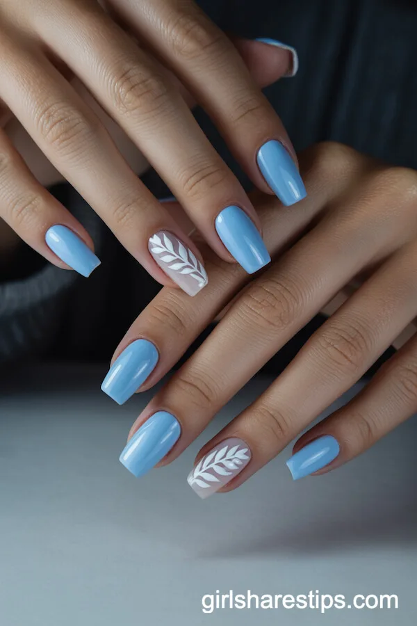 Short Coffin Nails With Baby Blue and White Leaf Art