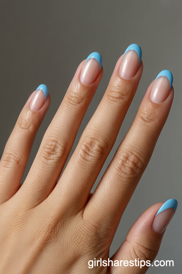 Short Round Nails With Baby Blue Heart Tips and Negative Space