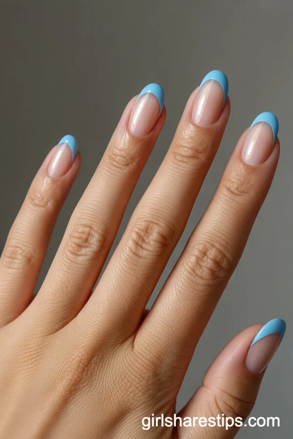 Short Round Nails With Baby Blue Heart Tips and Negative Space
