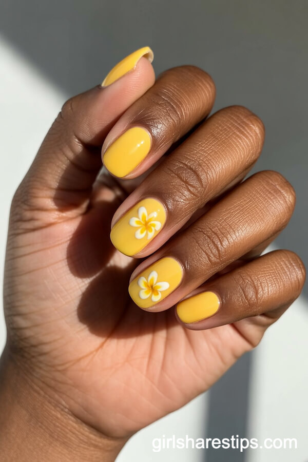 Bright Yellow Squoval Nails with White Plumeria Flowers