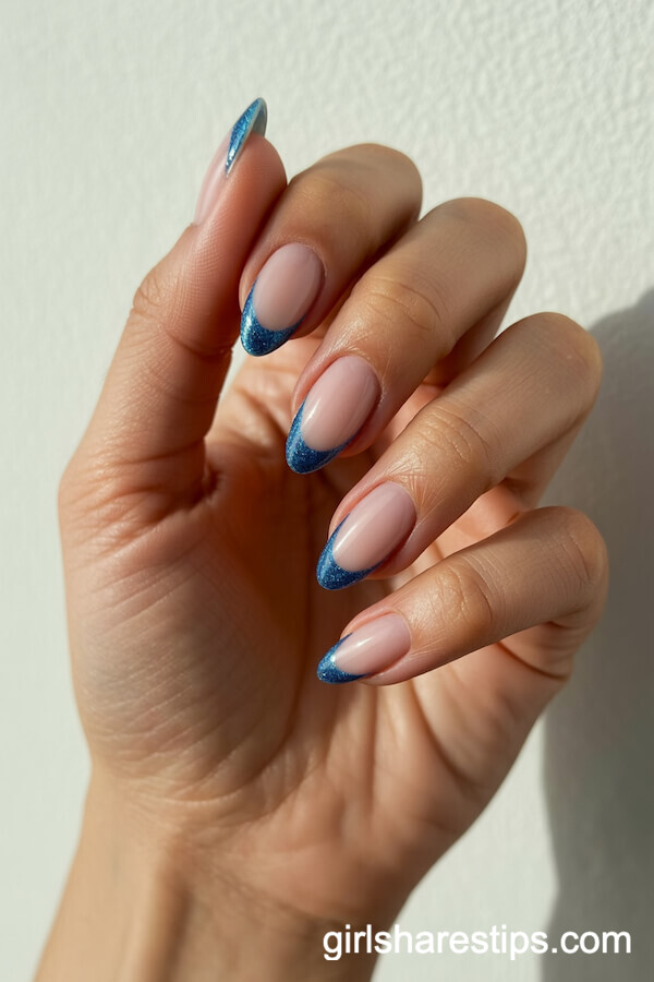 Nude-to-Blue Glitter Fade on Short Almond Nails