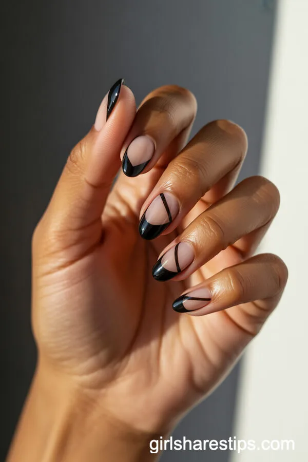 Black Negative Space Designs on Short Almond Nails
