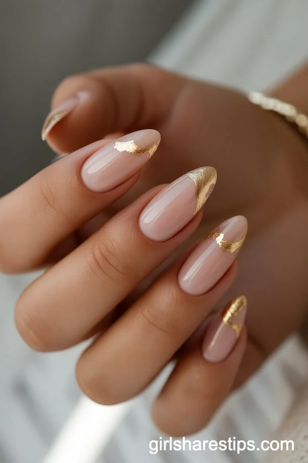 Short Almond Nude Nails with Gold Foil Accents