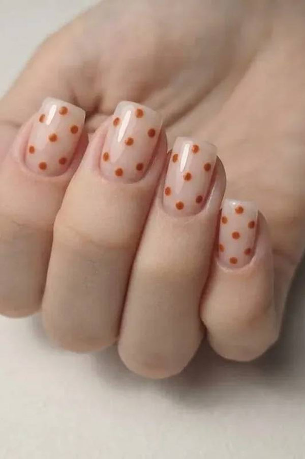 Matte Pumpkin Orange Short Nails with Black Accent