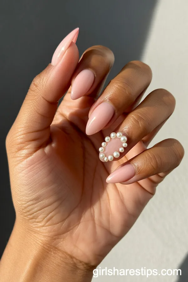 Stiletto Pink Nails with Pearl Stud Accents
