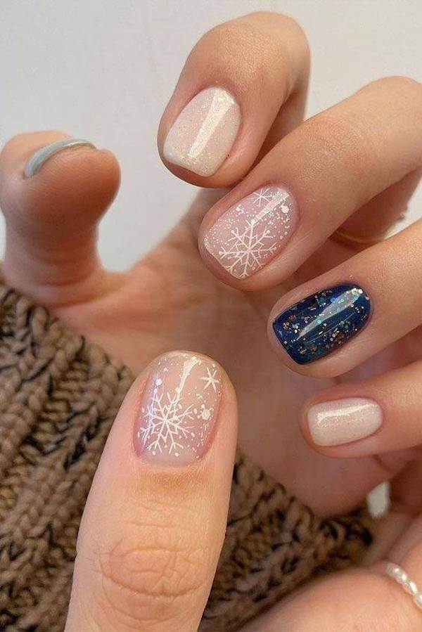 Sparkling Nude and Snowflake Nails