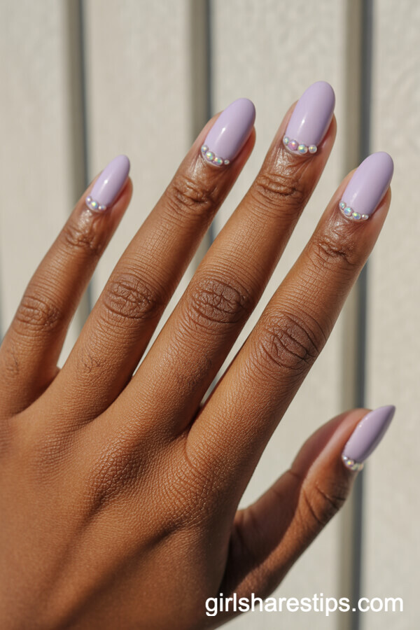 Soft Lavender Short Almond Nails with Iridescent Gems