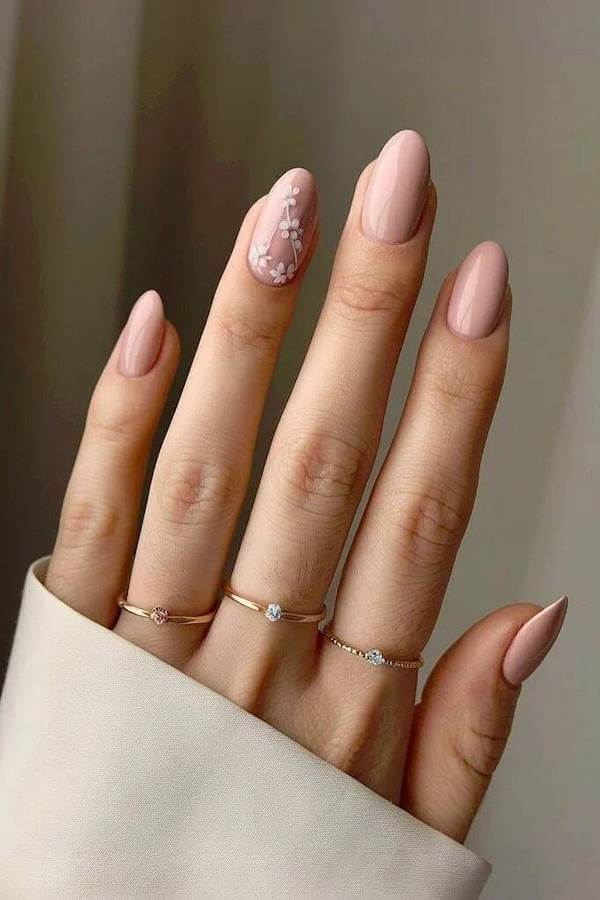 Blush Pink Nails with Delicate Floral Accent