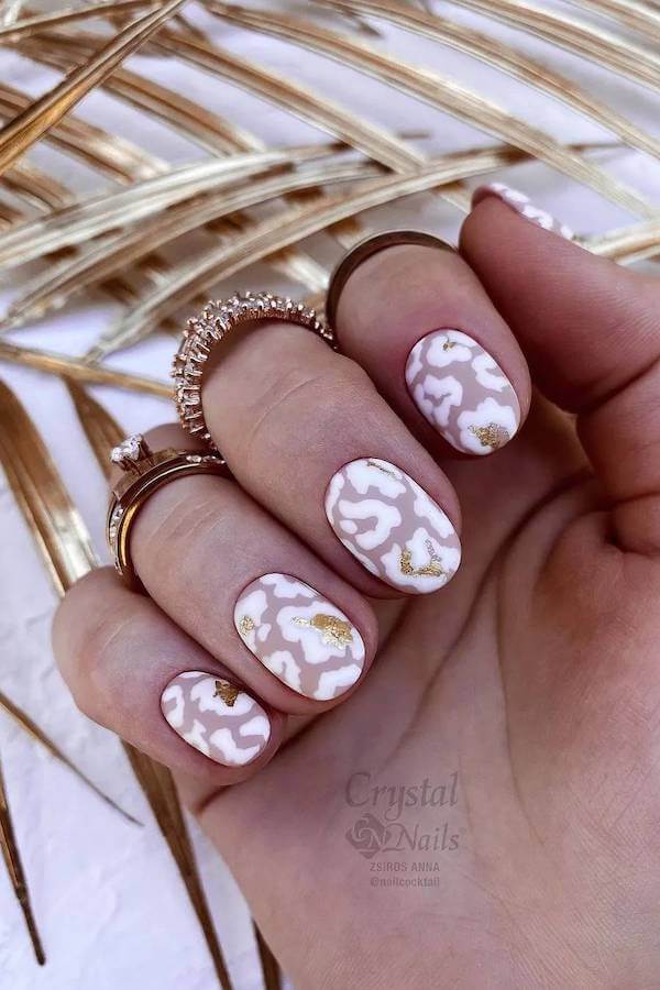Abstract White and Gold Nails