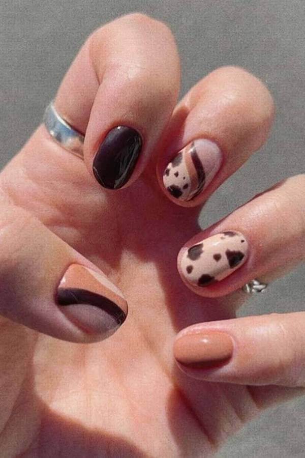 Brown Swirl and Cow Print Nails