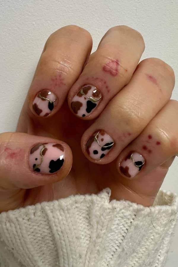 Gold Accent Cow Print Nails
