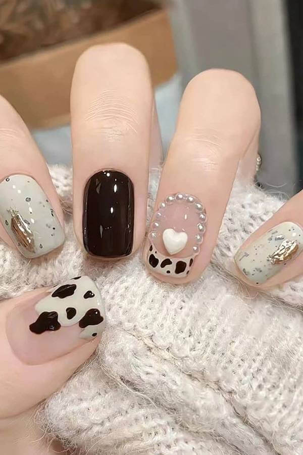 Neutral Cow Print and Heart Accent Nails