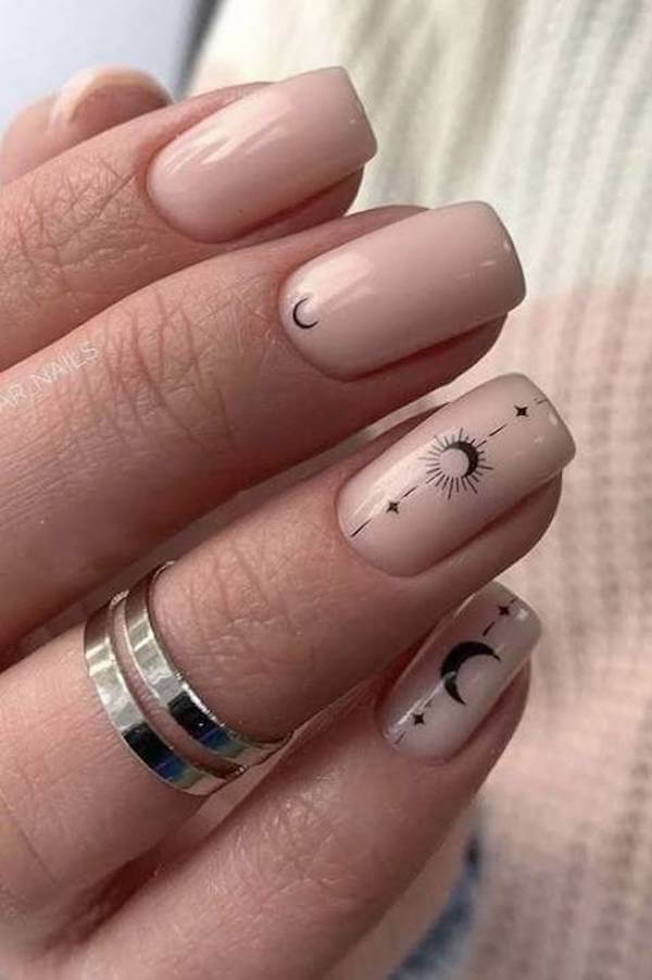 Nude Nails with Celestial Symbols