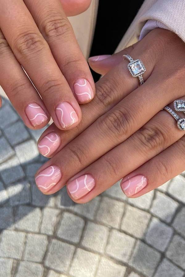 Pink Nails with White Swirls