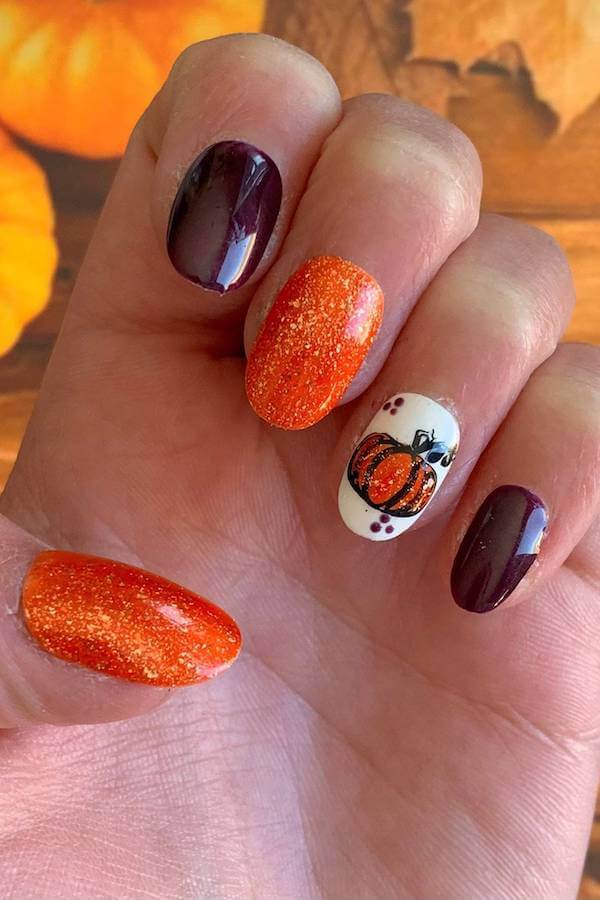 Pumpkin and Orange Glitter Nails