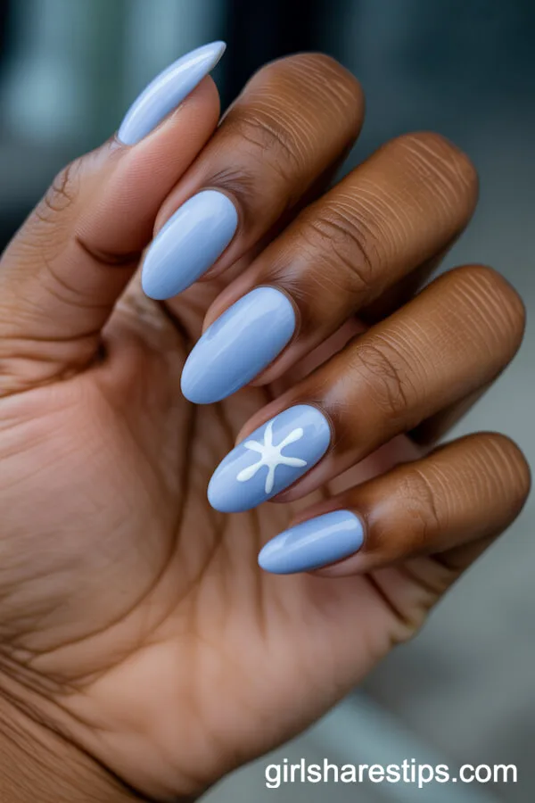 Pastel Blue Almond Nails with Simple Sea Life Accent