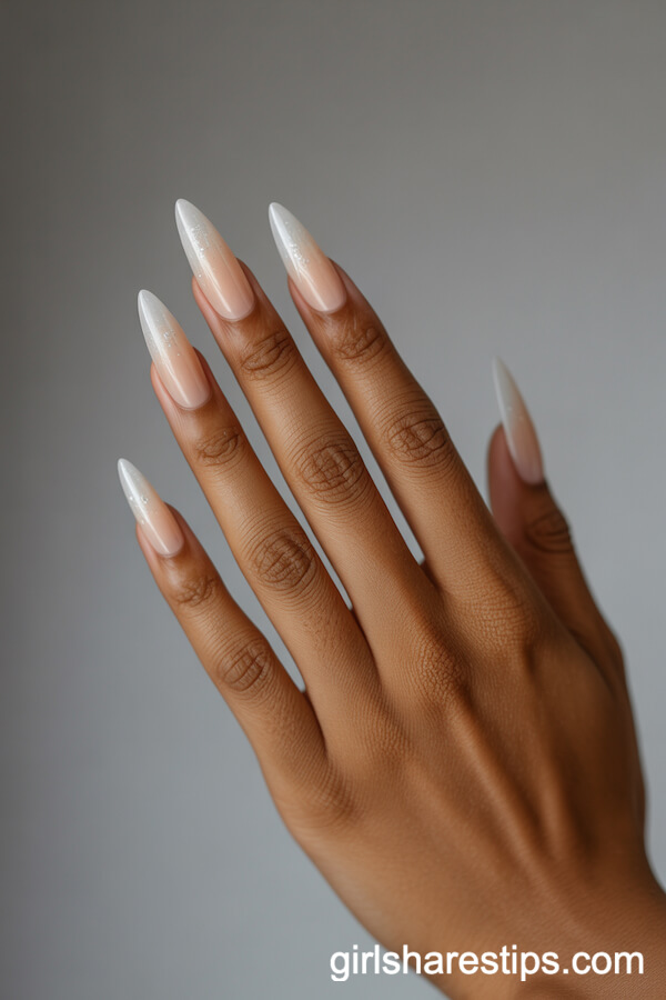 Nude-to-Beige Gradient Stiletto Nails with Sand-Like Shimmer