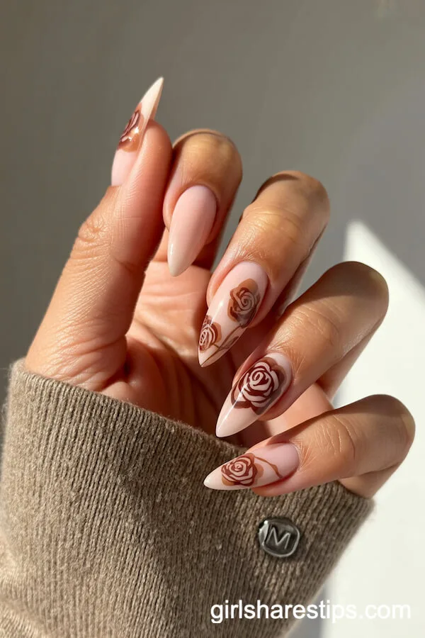 Creamy Nude Stiletto Nails with Earthy Wild Rose Designs