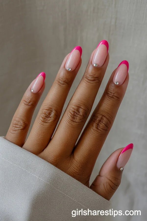 Pale Pink Almond Nails with Hot Pink French Tips and Rhinestones