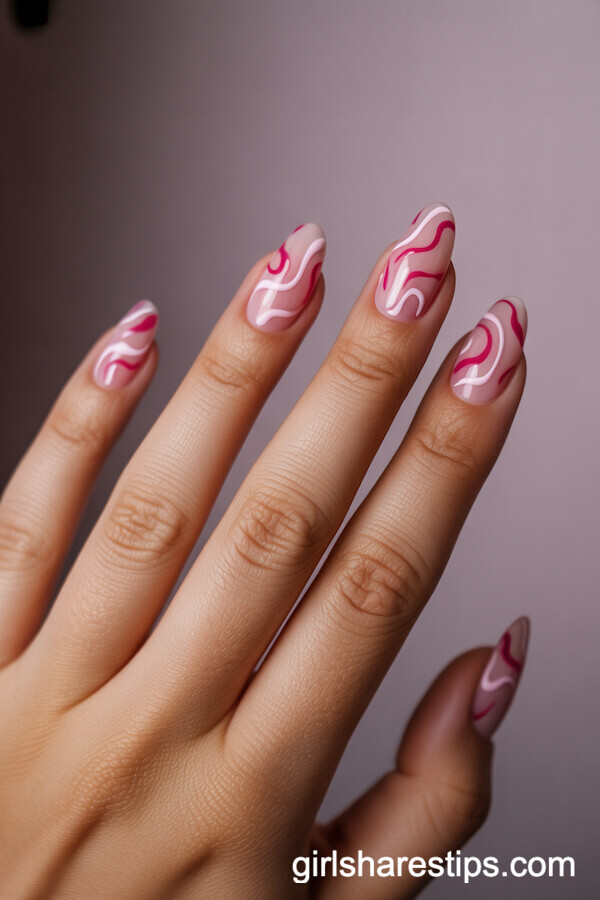 Clear Almond Nails with Pink Abstract Swirl Designs