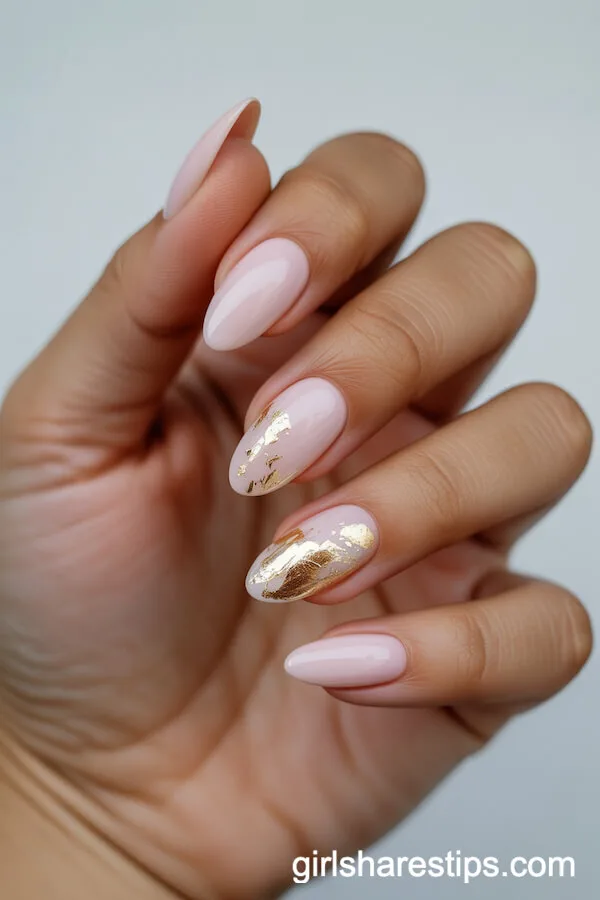 Pale Pink Almond Nails with Gold Foil Accents