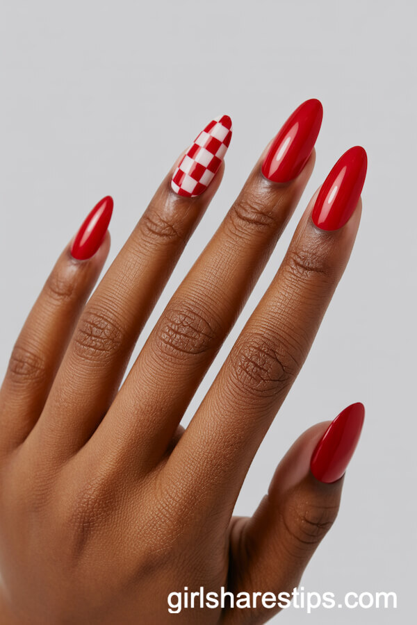 Almond Nails with Chic Red and White Checker Accent