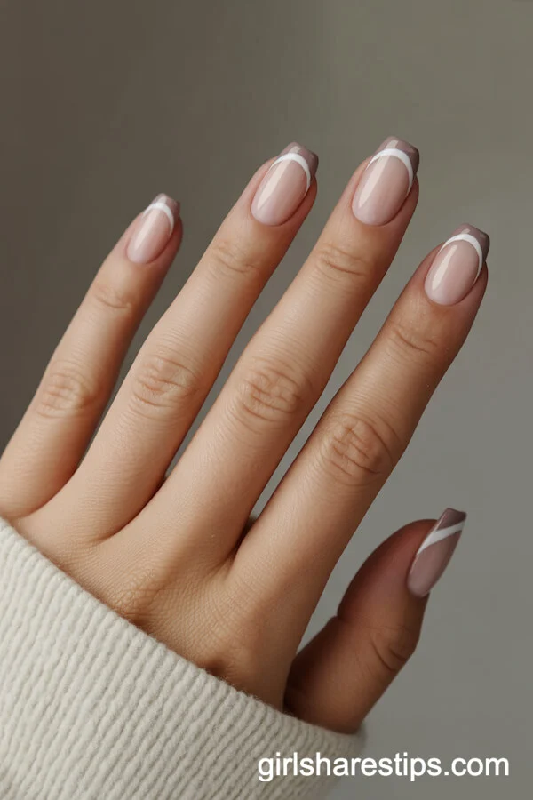 Subtle Taupe French Tips on Nude Nails
