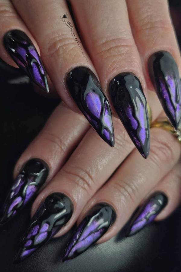 Glossy Purple and Black Witch Nails