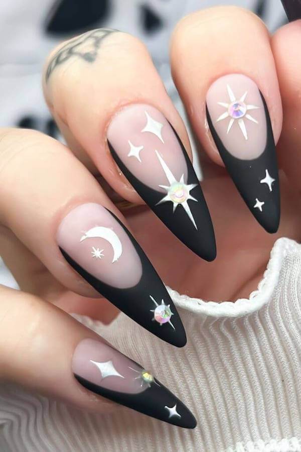 Matte Black Star and Moon Nails