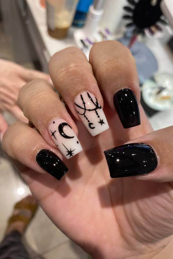 Celestial Black and White Nail Design