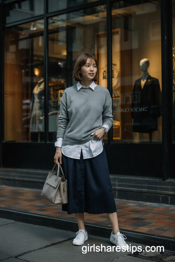 Gray Sweater Layered Over White Shirt with Navy Skirt