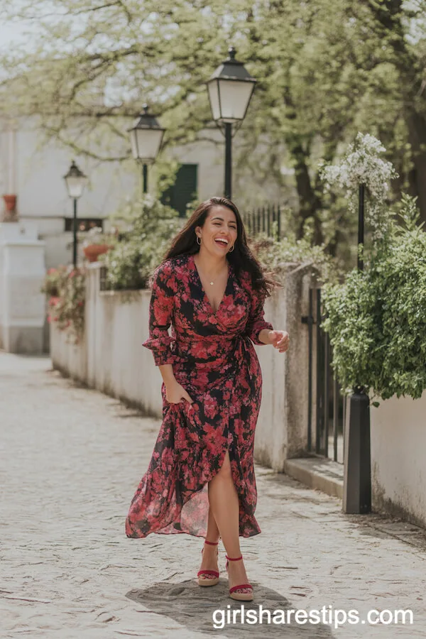 Bold Floral Print Wrap Dress on Cobblestone Path