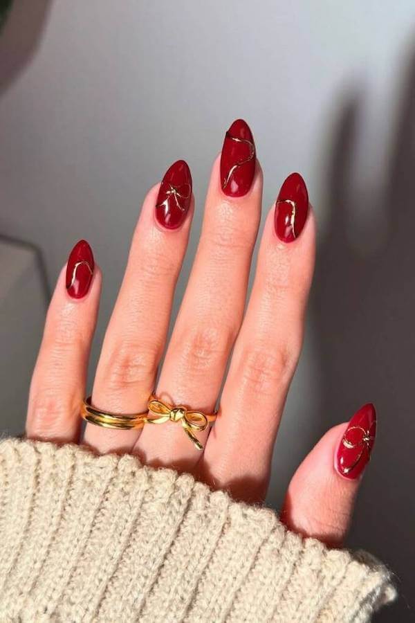 Red Glossy Nails With Gold Accents