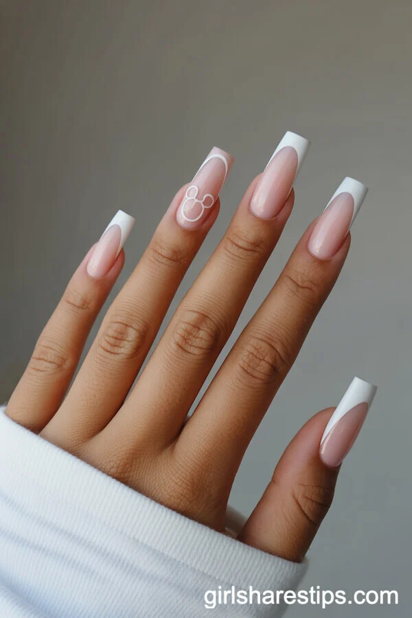 Blush Coffin Nails with Silver Mickey Outline French Tip