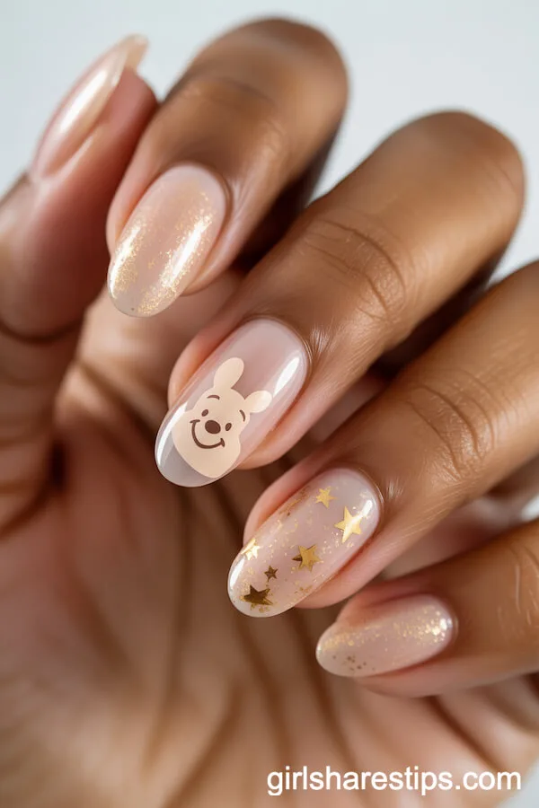 Nude-Pink Oval Nails with Winnie the Pooh and Gold Stars