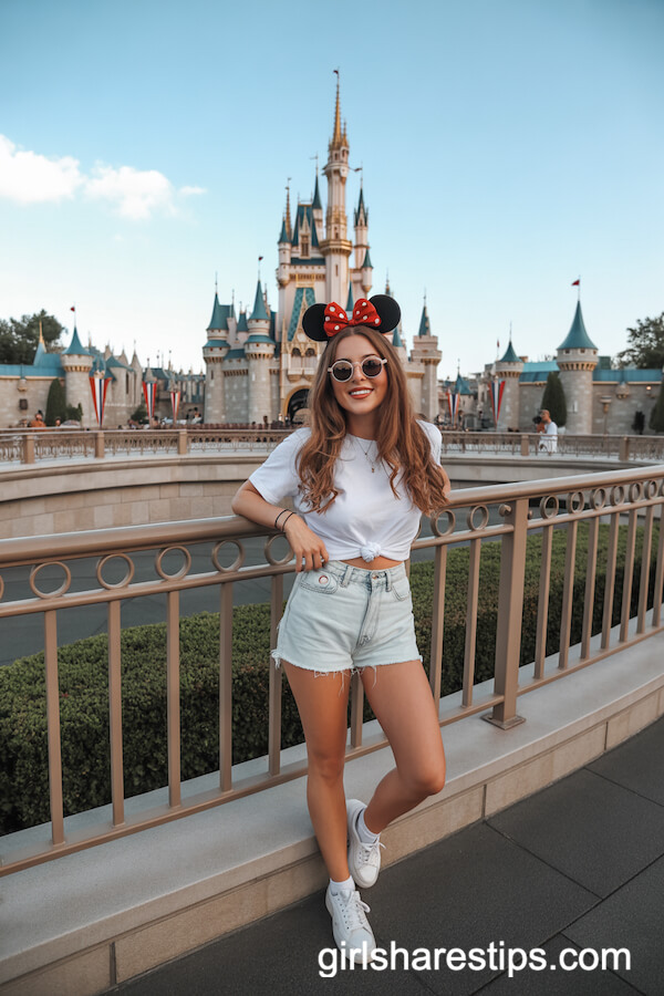 Classic Disney Castle Look: White Tee, Denim Shorts, and Minnie Ears