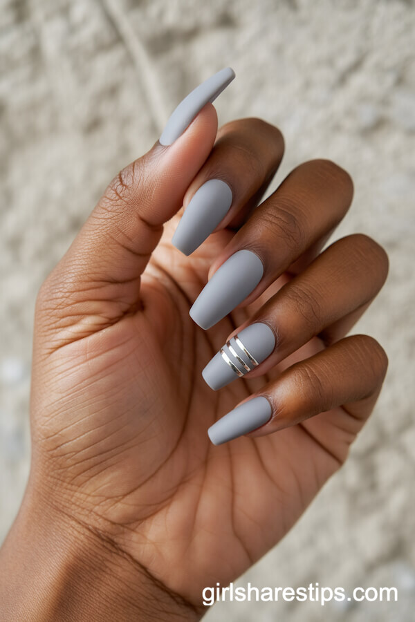 Matte Soft Gray Coffin Nails with Silver Stripe Accents