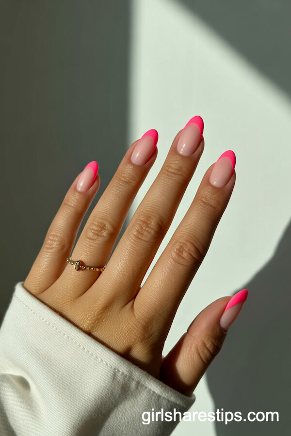 Neon Pink French Tips on Almond Nails