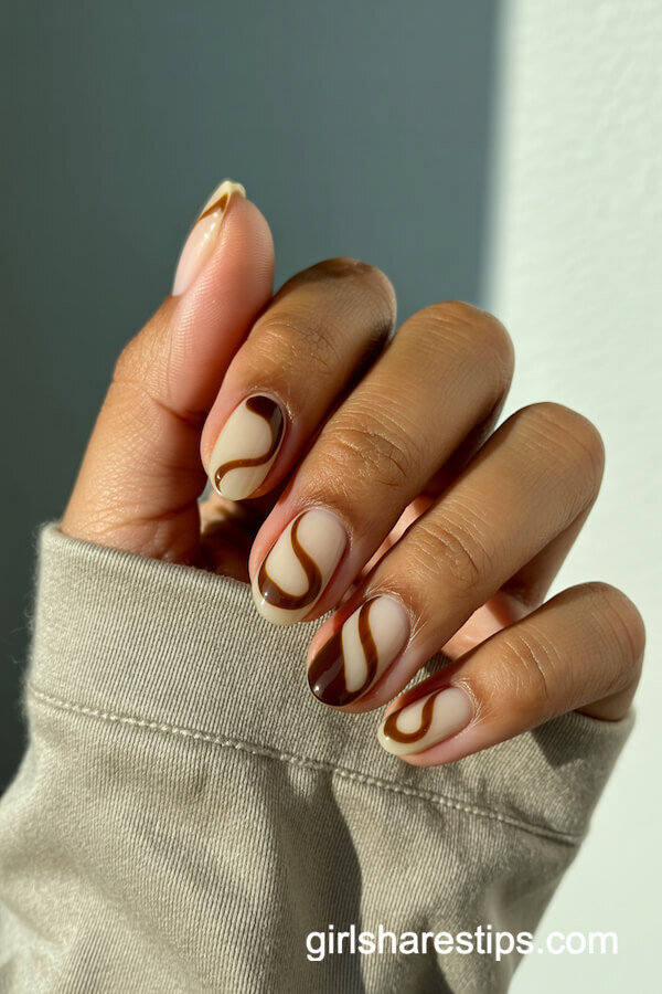 Creamy Latte Oval Nails with Brown Swirls
