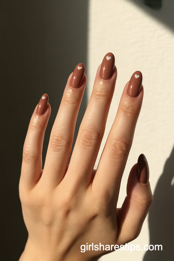 Sheer Cocoa Squoval Nails with White Heart Accents